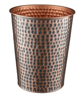 Monarch Abode hand hammered metal wastebasket with artisanal texture for an elegant bathroom