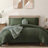 Monbix Queen Comforter Set olive green on bed, all-season coziness