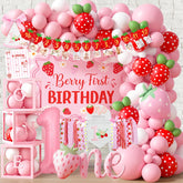 Monnberry Berry First backdrop creates a photo-worthy setup for a baby girl's first birthday.
