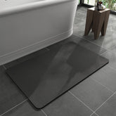 MontVoo bath mat with rubber backing provides secure non-slip grip on wet bathroom floors.