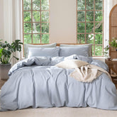 MooMee king duvet cover in cornflower blue on bed, breathable cotton texture for all-season comfort.