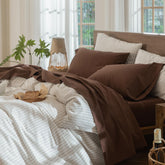 MooMee flat sheet in cocoa brown offers breathable comfort and a linen-like texture.