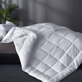 Moonsea downβalternative comforter with box stitching for even loft and plush comfort.