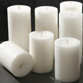 MOSROAD white pillar candle 2.8x4 inch close-up, clean burn.