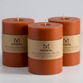 MOZEAL burnt orange 3x4 pillar candle glows warmly for intimate, rustic decor.
