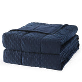 Mr. Sandman weighted blanket navy front view on bed shows inviting comfort