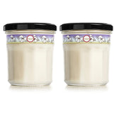 Mrs. Meyer's Compassion Flower candle in a recyclable jar for relaxing spaces.