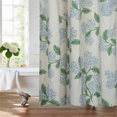 MUGINYU linen shower curtain with blue-green hydrangea print for a calming bath ambiance.