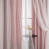 MYSKY HOME pink blackout curtains for girls' bedroom block glare and keep rooms cooler.
