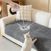 MYSKY HOME waterproof couch cover in dark grey protects against spills.