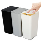 N. NETDOT 3-pack 10L trash can with lid front view showing slim profile for small spaces.