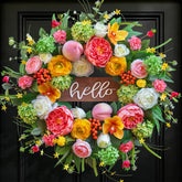 NaturaWre Spring Wreath front door peony detail enhances curb appeal.