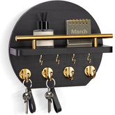 Nekon key holder wall assembly shows circular wood design with eight hooks for organized entryway storage.