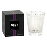 Nest New York Moroccan Amber candle in a glass vessel for a refined living room scent.