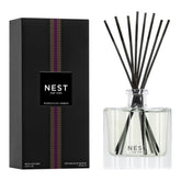 NEST New York Moroccan Amber diffuser close-up on glass vessel for warm ambiance