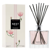NEST New York Himalayan Salt & Rosewater diffuser bottle releasing gentle fragrance for calm spaces.