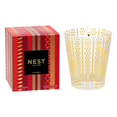 Nest New York scented classic Christmas candle in a glass vessel for festive ambiance.