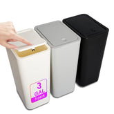 N. NETDOT slim trash can with lid in off white keeps pets out.