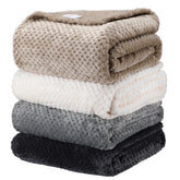 Newwiee 4-piece waffle fleece throw set shows plush warmth and decor versatility