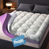 Niagara Sleep Solution dual-layer topper closeup shows plush memory foam for pressure relief.