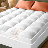 Niagara Sleep Solution Ultra-Thick Topper plush loft on bed for added comfort.