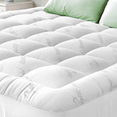 Niagara Sleep Solution Ultra Soft Twin XL topper on bed showing cooling comfort