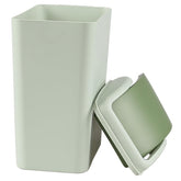 Nicesh 4.5-gallon trash can with swing lid enables quick, clean disposal.