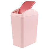 Nicesh 4.5-gallon pink trash can with swing lid, space-saving top view.