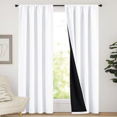 NICETOWN 100 blackout curtain panels two piece set in white for nursery or bedroom use