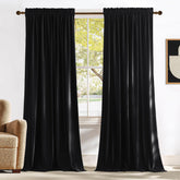 NICETOWN velvet blackout curtain panel setup blocks light for immersive movie nights.