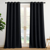 NICETOWN 2-panel grommet top drapes hung smoothly for modern look and light control.