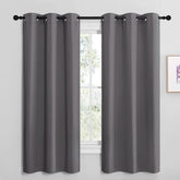 NICETOWN grey blackout curtain panel blocks light for bedrooms.