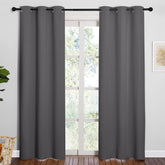 NICETOWN left panel on window showing textured blackout fabric for privacy