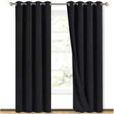 NICETOWN blackout panel with silver grommets for quick installation.