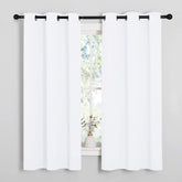 NICETOWN white curtain close-up with silver grommets for smooth sliding.