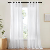 NICETOWN white sheer curtain pair 54w-102l lets soft daylight in while framing your view.