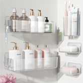 Nieifi adhesive wall shelf in clear finish mounted in bathroom for organized storage.