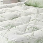 NightHug bamboo topper close-up cover shows soft, breathable fabric for cooler nights.