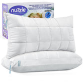 Nuzzle king-size 2-pack pillow on bed offers hotel-like comfort for guests.
