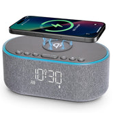 Odokee wireless charging alarm clock radio top view with clutter-free nightstand charging.