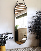 OGCAU oval mirror with aluminum frame for durable elegance in any room.