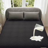 OhGeni waterproof mattress protector in queen size protecting surface from spills for dry nights