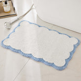 Ohocut luxury bath rug with white and blue scalloped piping adds plush style.