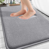 OLANLY thick memory foam bath mat by the tub offering cloud-like comfort