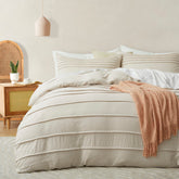 Oli Anderson beige pleated duvet cover in king size, adds textured elegance to any bedroom.