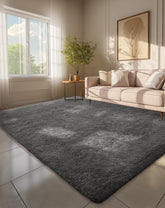Ophanie 6x9 rug with soft shaggy gray texture adds cozy comfort to living rooms.