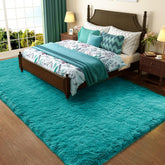 Ophanie teal shag rug with plush texture for cozy bedrooms.