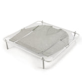OXO Good Grips Folding Sweater Dryer on a clean table for delicate air drying
