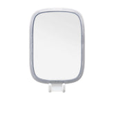 OXO Good Grips suction cup attachment provides secure, tool-free mounting on glass or tile.
