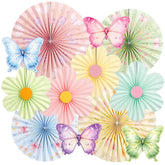 Paper Jazz butterfly flower paper fan on wall adds garden party flair.